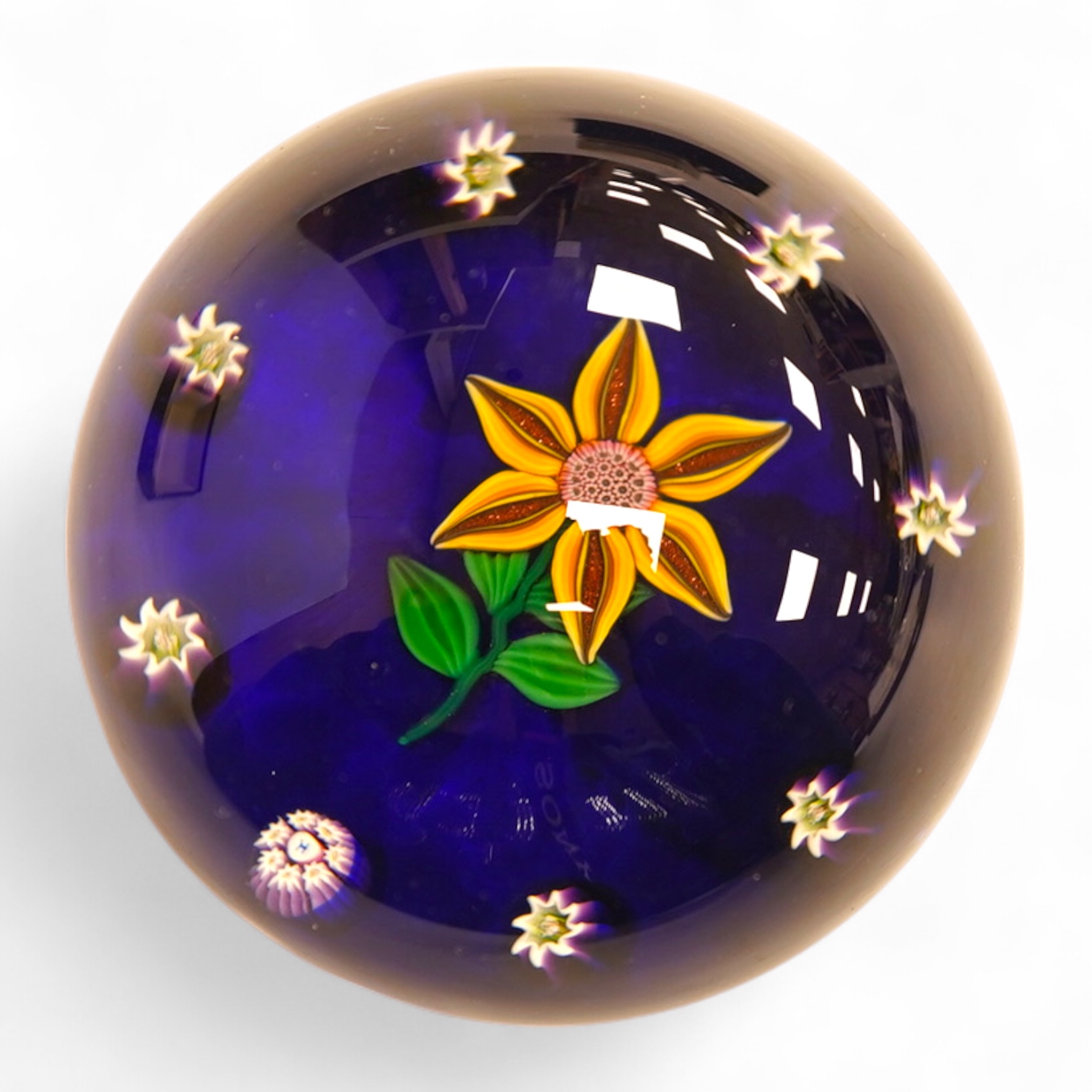 A boxed Paul Ysart floral paperweight, 7cm in diameter